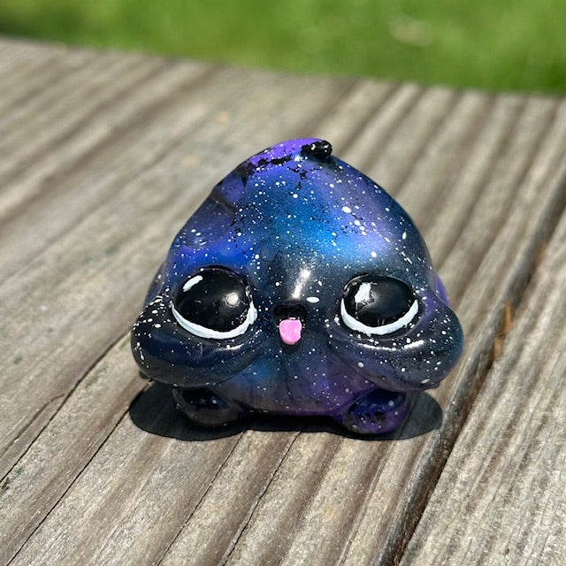 Little Shit Bigger Deal - Beasties Bites by Dear Beasties x Trash Panda, a small, intricately painted toy resembling a butterfly on a wooden surface.