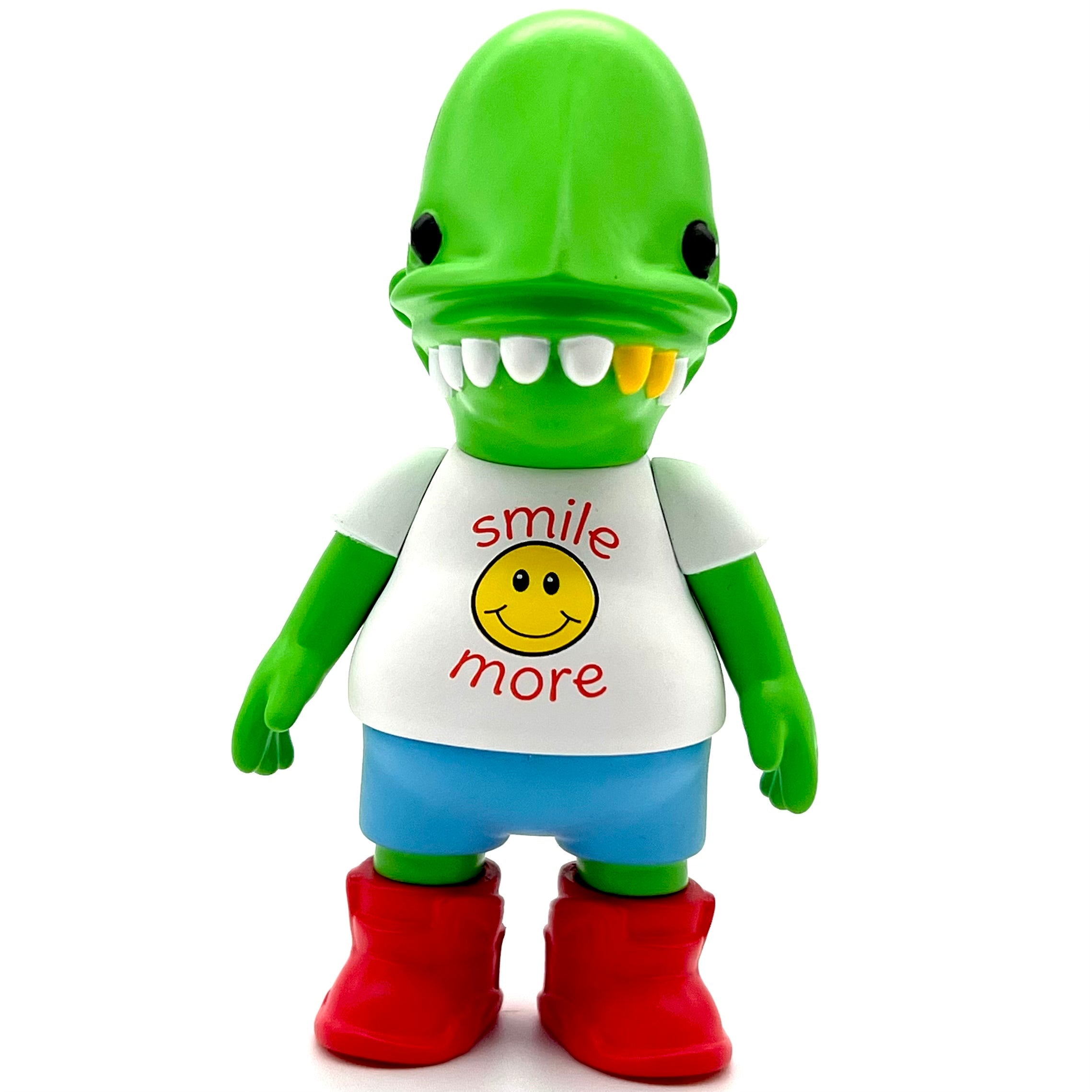 Goop Massta - Smile More Edition, a 4 vinyl figure with a white shirt and red boots, designed by Miami's Goop Massta, limited to 150 pieces.