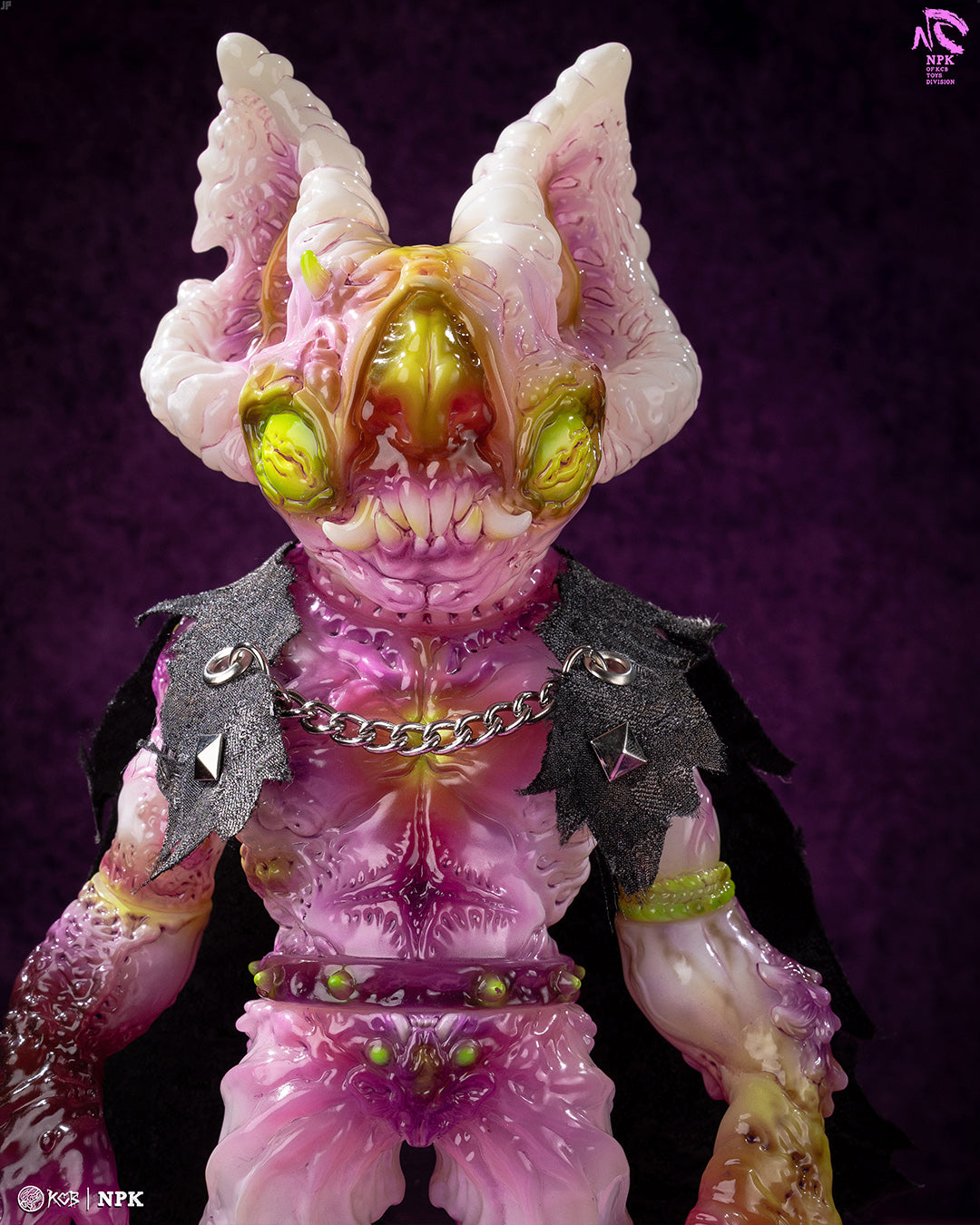 NPK · Poison Veil Ver. & Jack o’ Lantern III by KCB Toy: A whimsical, translucent sofubi art figure with insect eyes and horns, featuring a torn cape and chain accessory.