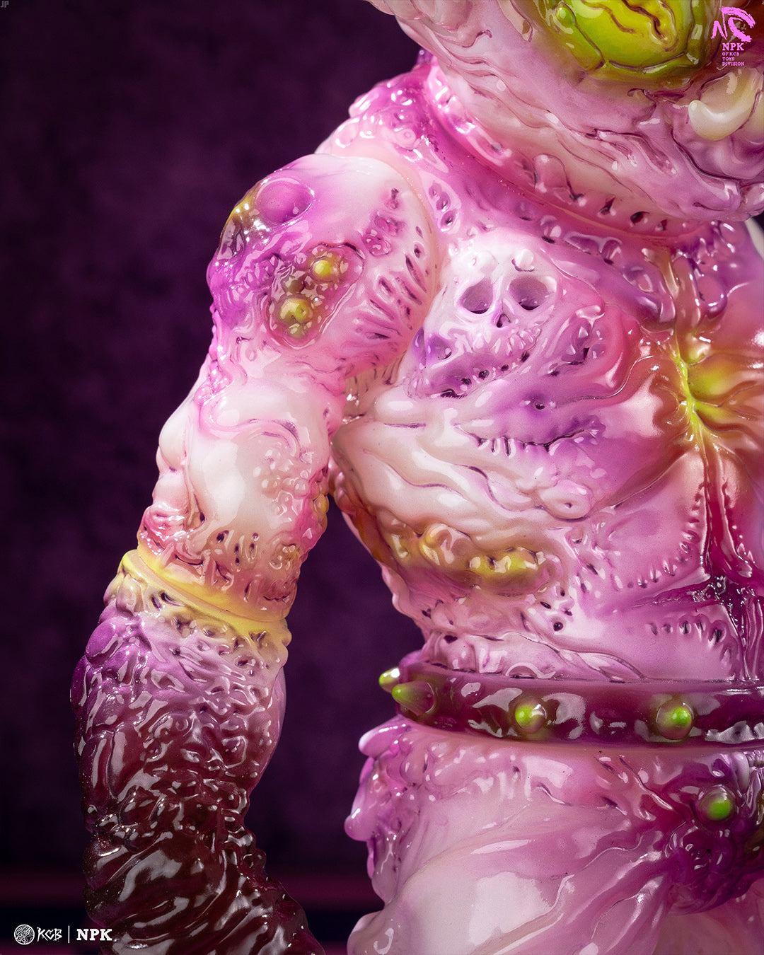 Vinyl art figure, NPK · Poison Veil Ver., features a mutated humanoid with pustules and oozy textures, preorder at Strangecat Toys. Includes custom cloak and shoulder bag.