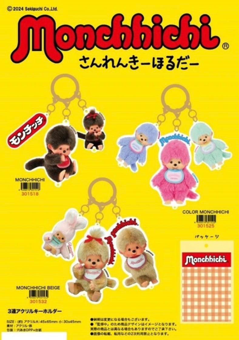 Key Ring Monchhichi 3-piece acrylic key-holder set with classic, pastel, and beige character themes, displayed on a promotional yellow poster by Sekiguchi Co., Ltd.