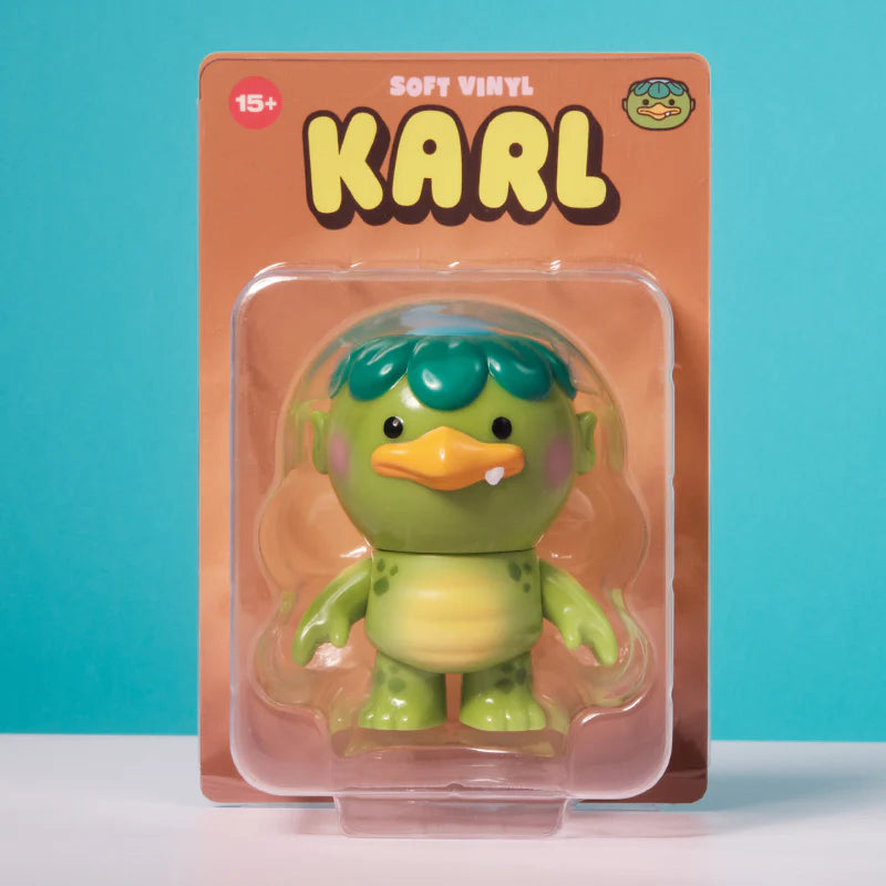 Karl - Soft Vinyl Figure by Christopher Lee, a 4 sculpted kappa enjoying nature, available for preorder, ships estimated June 2025.
