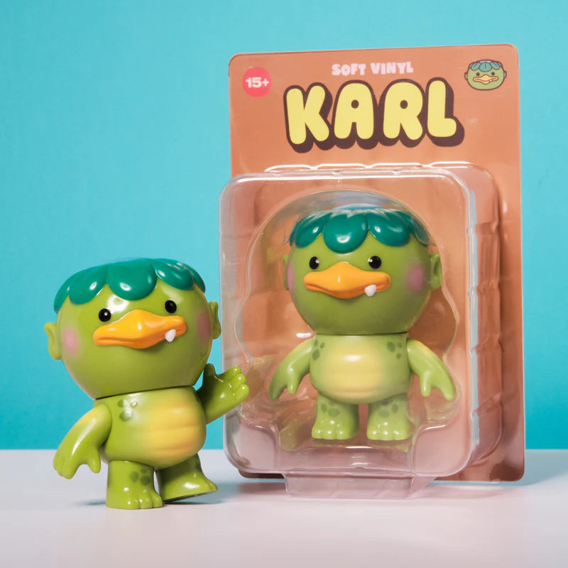 Karl - Soft Vinyl Figure by Christopher Lee, a 4 kappa character, enjoys fishing and nature, available for preorder, shipping estimated June 2025.