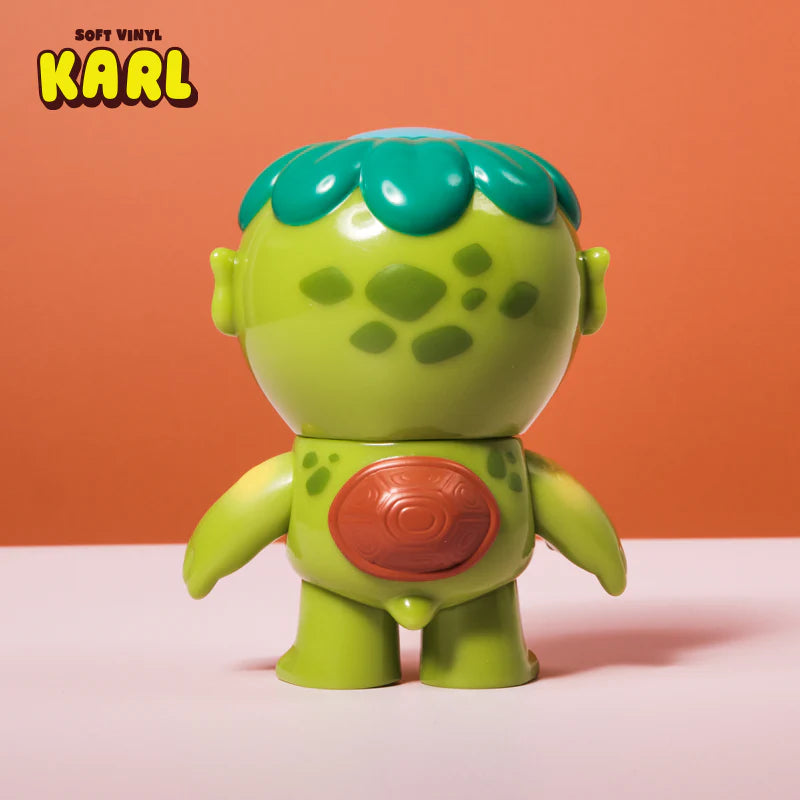 Karl - Soft Vinyl Figure by Christopher Lee, a 4 tall kappa enjoying nature, available for preorder, sculpted by Brandon Lyon, ships June 2025.