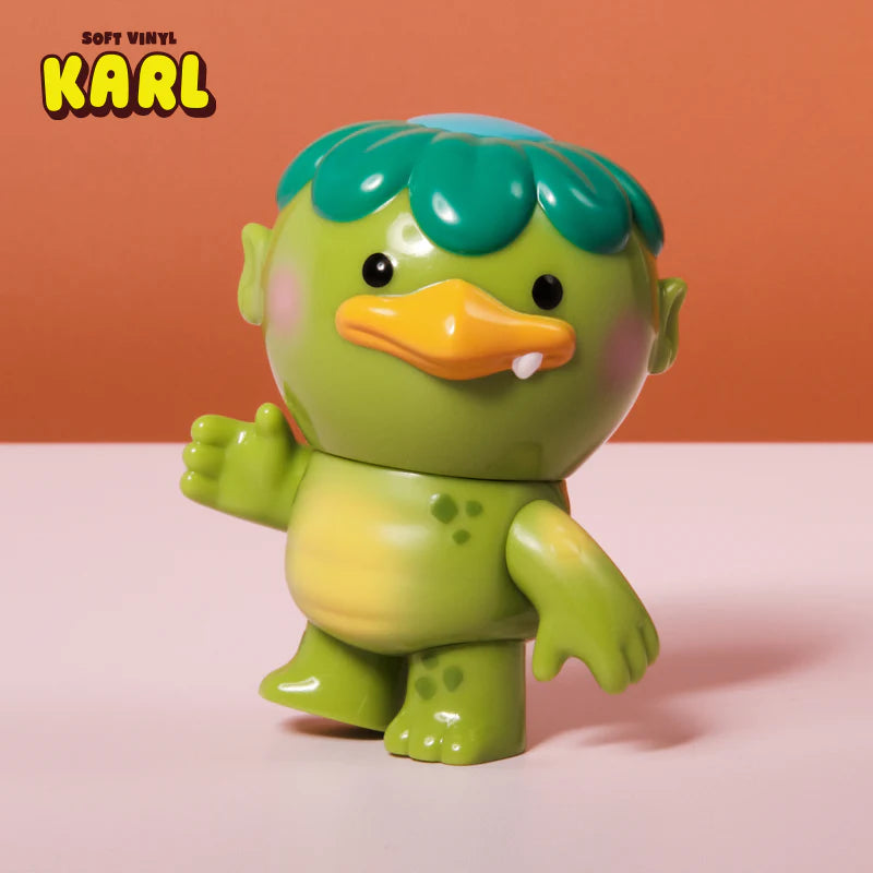 Karl - Soft Vinyl Figure by Christopher Lee, 4 tall, showcasing a friendly kappa enjoying fishing and nature. Preorder now, ships estimated June 2025.