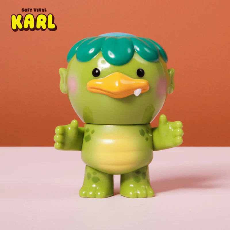 Karl - Soft Vinyl Figure by Christopher Lee, a 4 kappa enjoying fishing, building, and nature. Available for preorder, sculpted by Brandon Lyon, ships June 2025.
