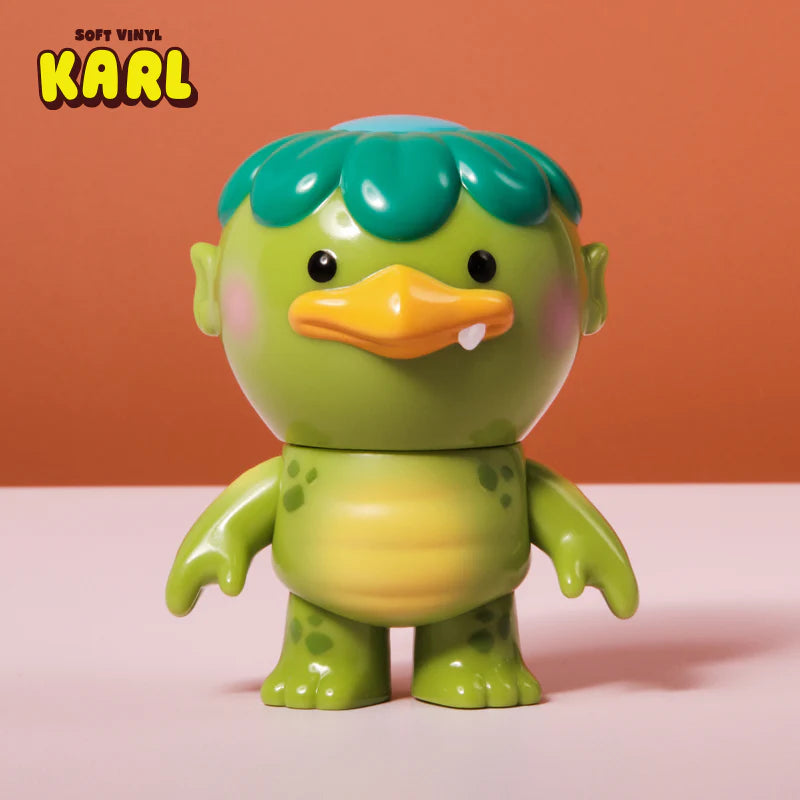 Karl - Soft Vinyl Figure by Christopher Lee, a 4 kappa enjoying nature, available for preorder, ships June 2025. Sculpted by Brandon Lyon.