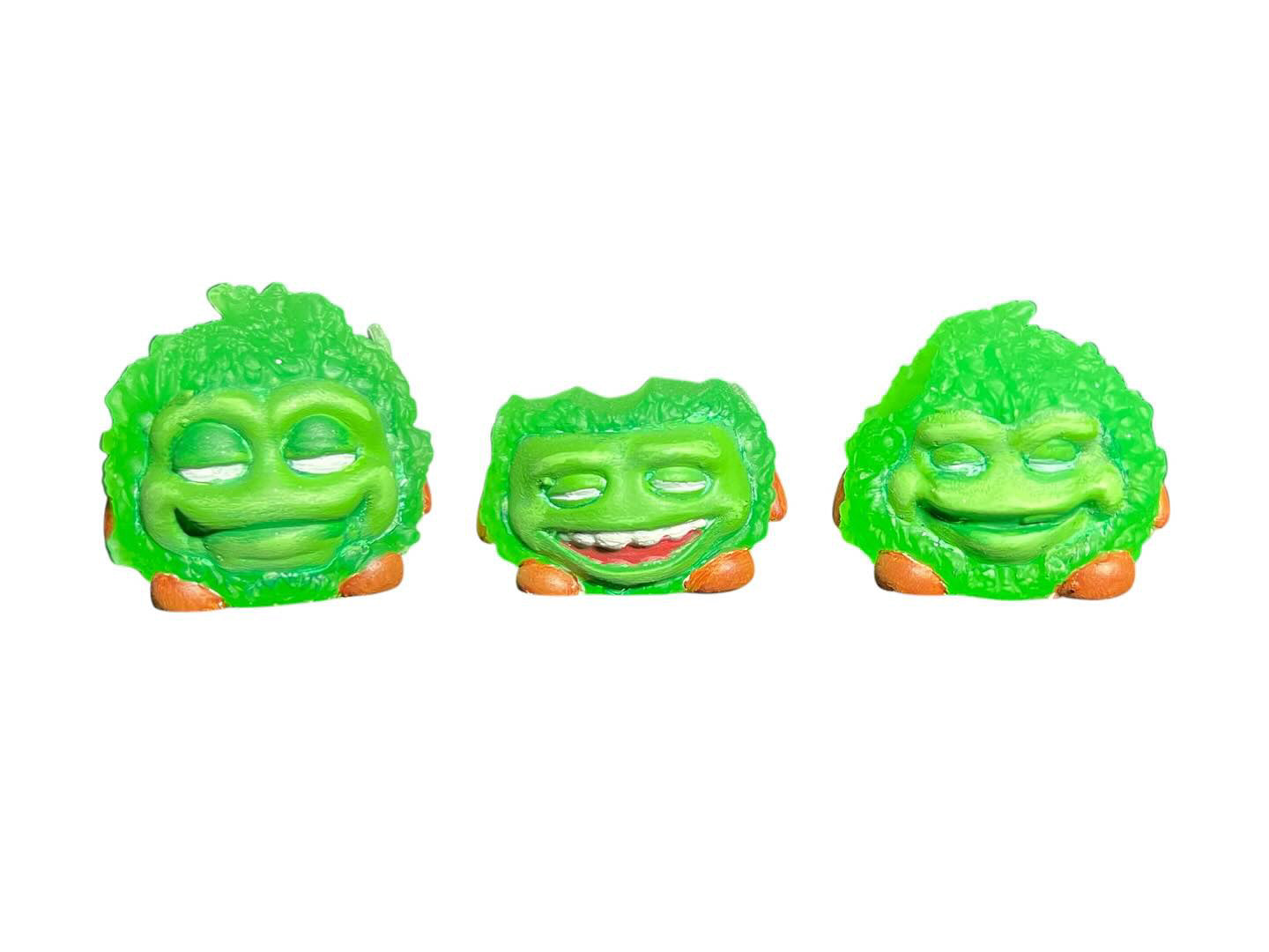 Bite Me - Bud Bites by Fettup: Unique green and orange character toy with distinct facial features, part of a mixed media, limited edition art toy collection.