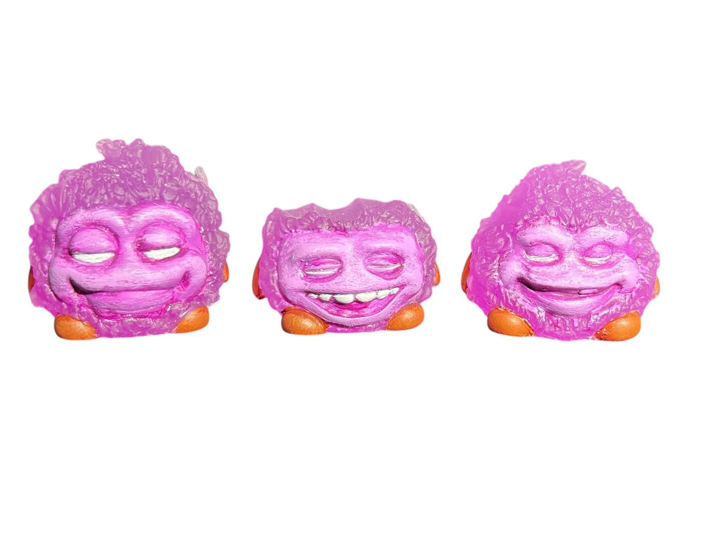 Bite Me - Bud Bites by Fettup: A whimsical mixed-media toy featuring a purple character with closed eyes and a pink face.