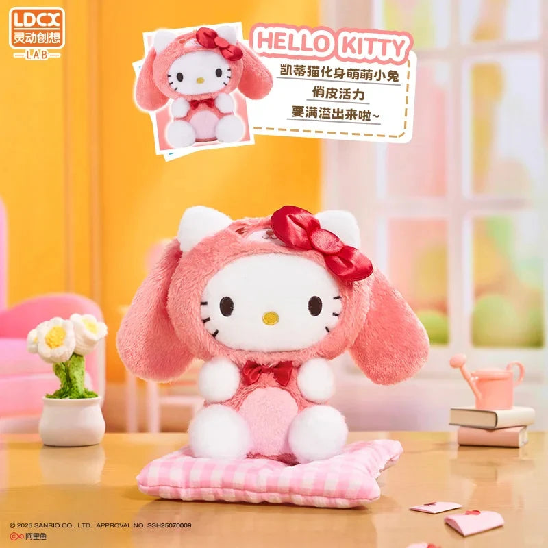 Hello Kitty plush in a pink bunny costume, sitting on a gingham cushion, surrounded by playful props; part of the Overjoyed - Sanrio Family Plush Blind Box.