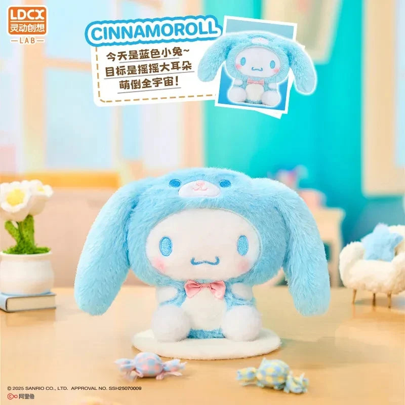 Cinnamoroll plush dressed as a blue bunny with rosy cheeks and a pink bow, part of the Overjoyed - Sanrio Family Plush Blind Box collection.