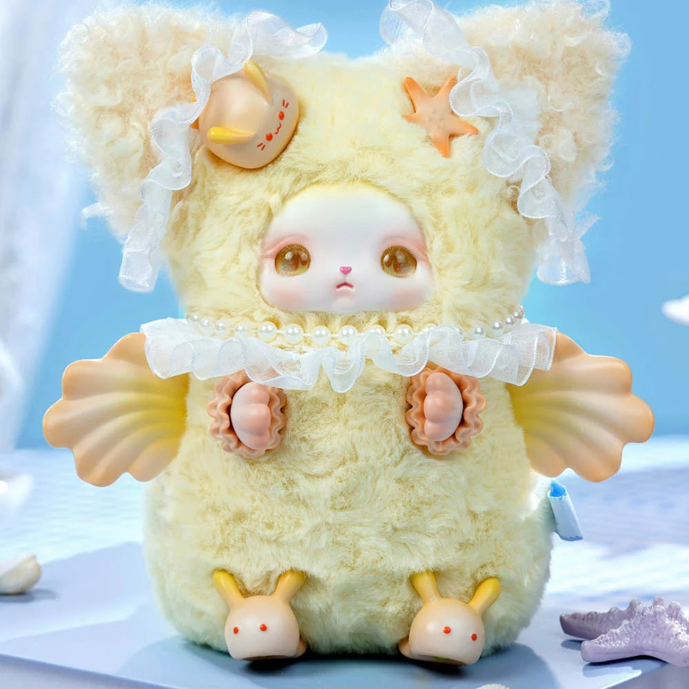 Loloan Ocean Series Plush Blind Box features a whimsical collectible plush with cat-like ears, shell appendages, and bunny-head shoes, blending plush and resin art toy aesthetics.