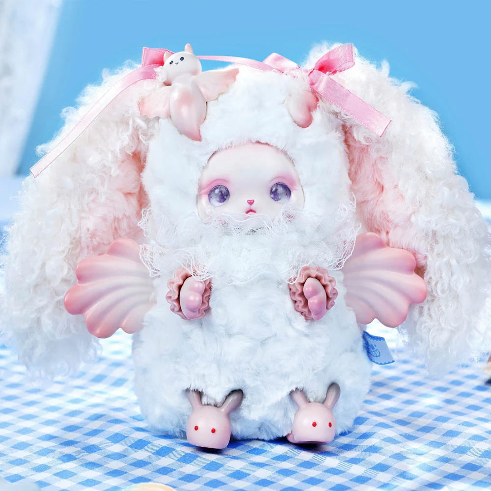 Loloan Ocean Series Plush Blind Box featuring a whimsical plush toy with fluffy fur, oversized ears, and pastel-pink appendages, embodying a fantastical, storybook character.