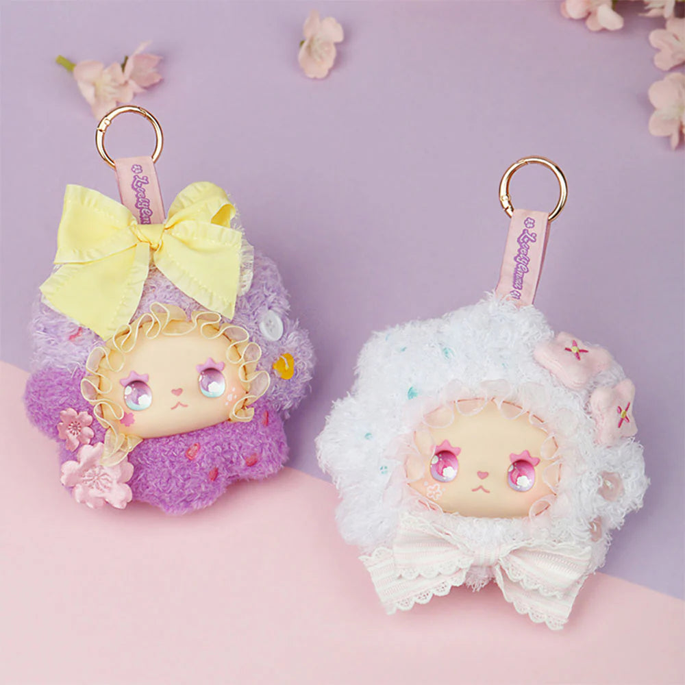 Lovely EMMA Floral Seasons Series plush keychains featuring lamb characters with floral accents, star-shaped eyes, and gold-tone rings, available for preorder at Strangecat Toys.
