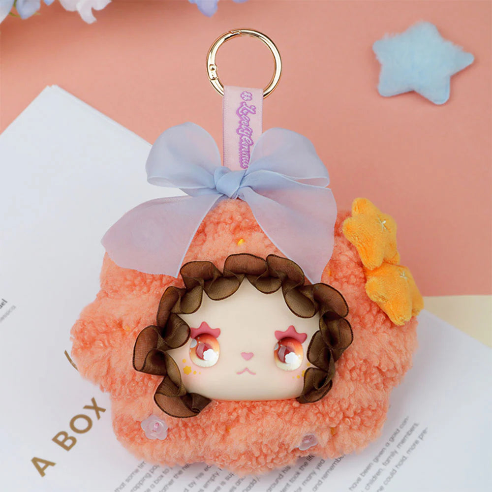 Lovely EMMA Floral Seasons Series plush key-chain purse featuring a doll face, star-shaped eyes, and gold key ring. Preorder for Strangecat Toys' blind box collection.