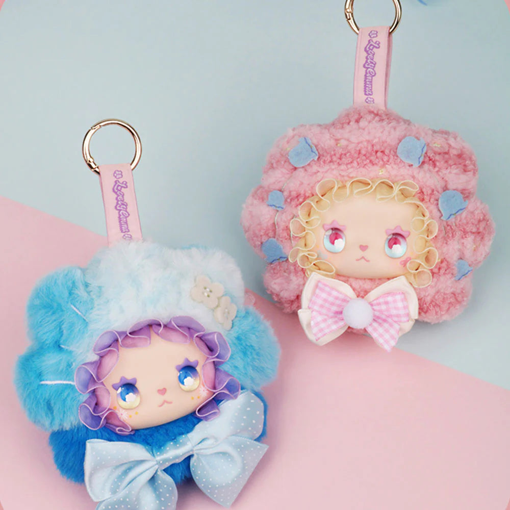 Lovely EMMA Floral Seasons Series plush key-chain charms with fluffy hair and bows, available for preorder as part of Strangecat Toys' blind box collection.