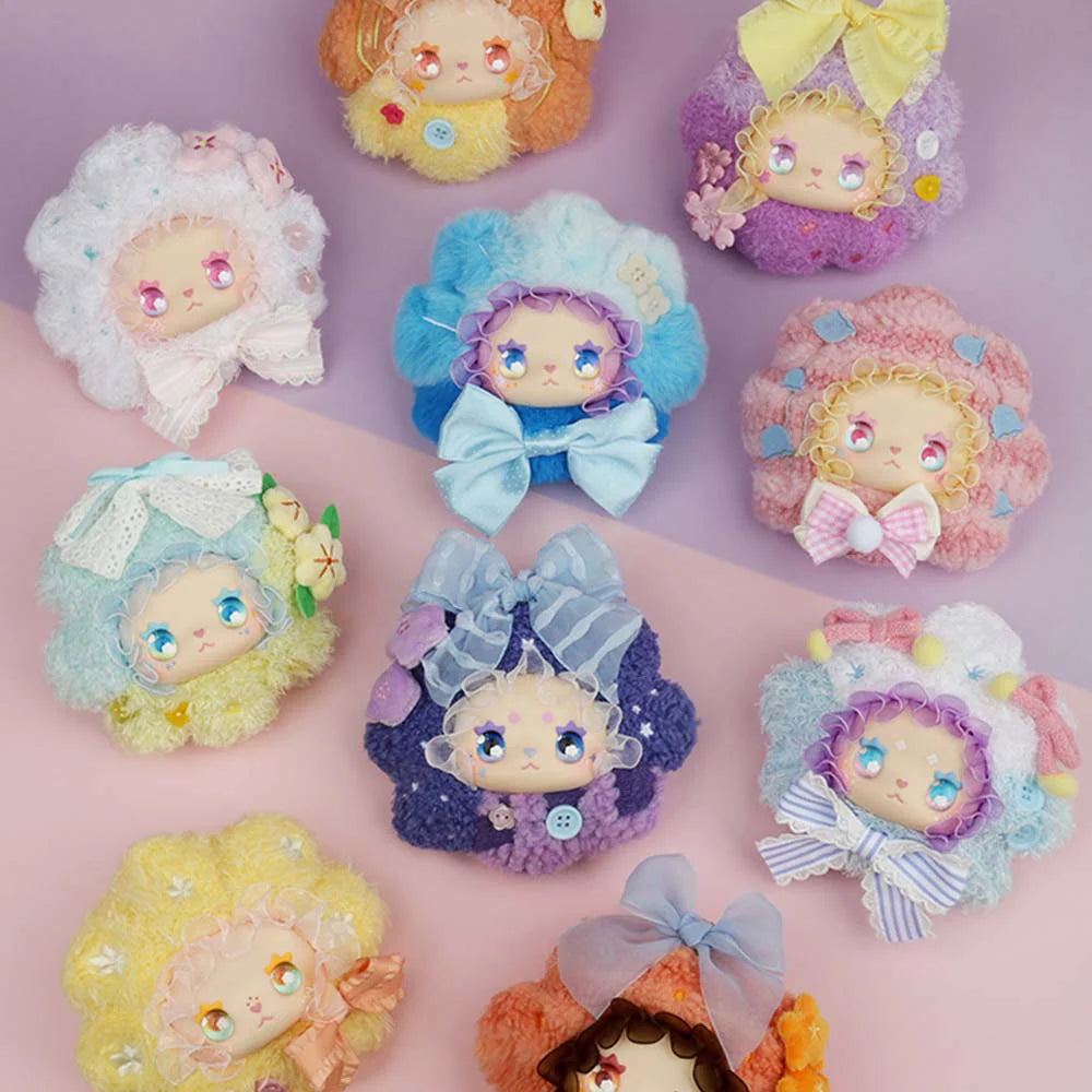 Lovely EMMA Floral Seasons Series Plush Blind Box features kawaii-style plush faces with sparkly eyes, fluffy hair, and decorative bows, available for preorder.