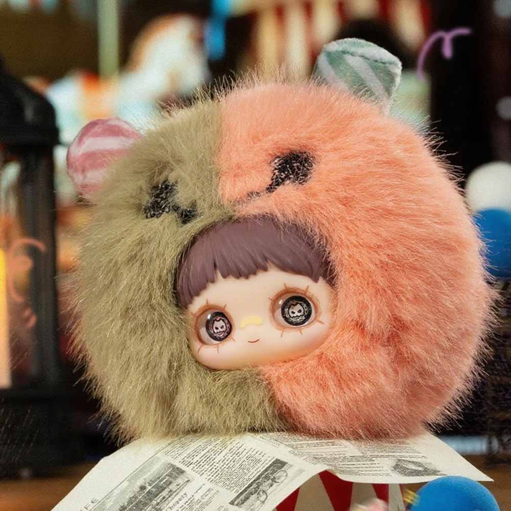 MayMei Crazy Circus Series Plush Keychain Blind Box featuring a two-toned plush toy with a stylized doll face, displayed on printed paper.