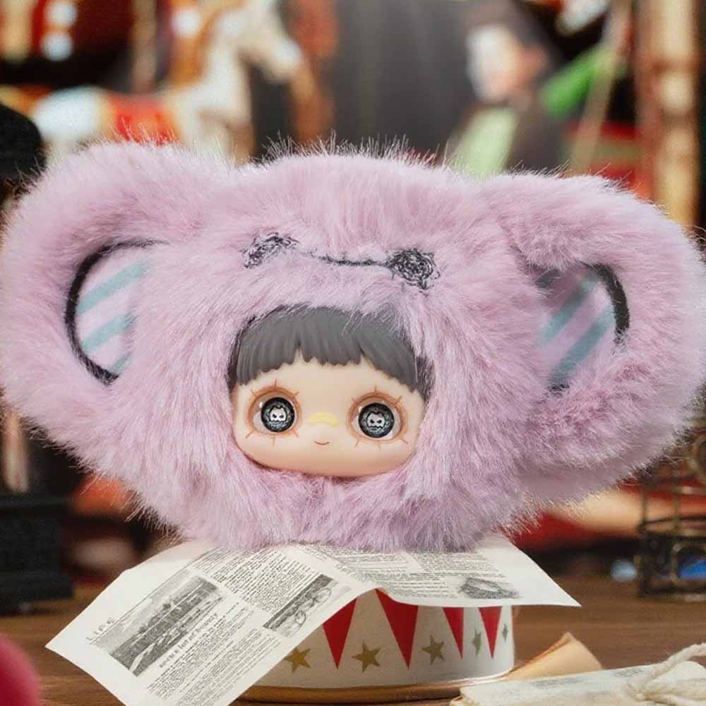 MayMei Crazy Circus Series Plush Keychain Blind Box featuring a doll’s head with a pink animal-ear hat, displayed on a circus-themed tin.