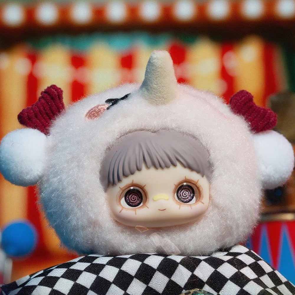 MayMei Crazy Circus Series Plush Keychain Blind Box features a doll in a sheep hood with red horns and pom-poms, showcasing whimsical design.