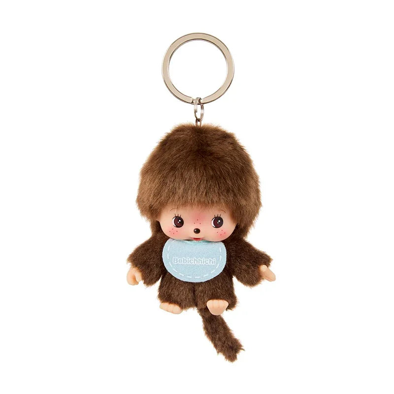 Monchhichi Bebichhichi Boy Keychain with soft brown fur and a vinyl face, featuring a blue bib and metal split ring for attachment.