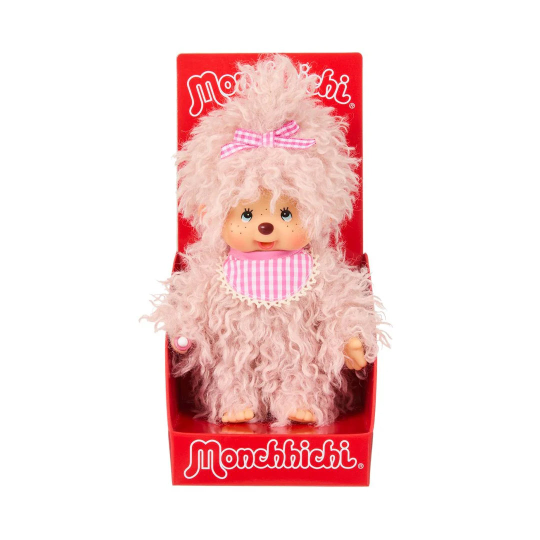 Monchhichi Girl - Fluffy Pink Beige Plush Toy in display box, featuring pink fluffy fur, gingham bow, and bib, perfect for collecting or gifting.