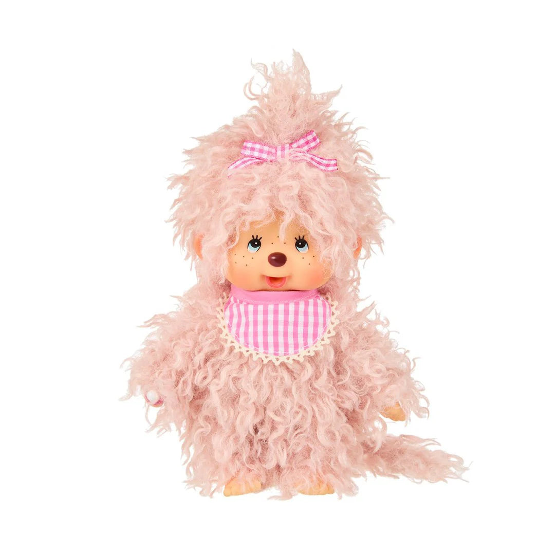 Monchhichi Girl - Fluffy Pink Beige Plush Toy with curly fur, plastic face, big eyes, pink gingham bow, and matching bib. Perfect for cuddling or collecting.