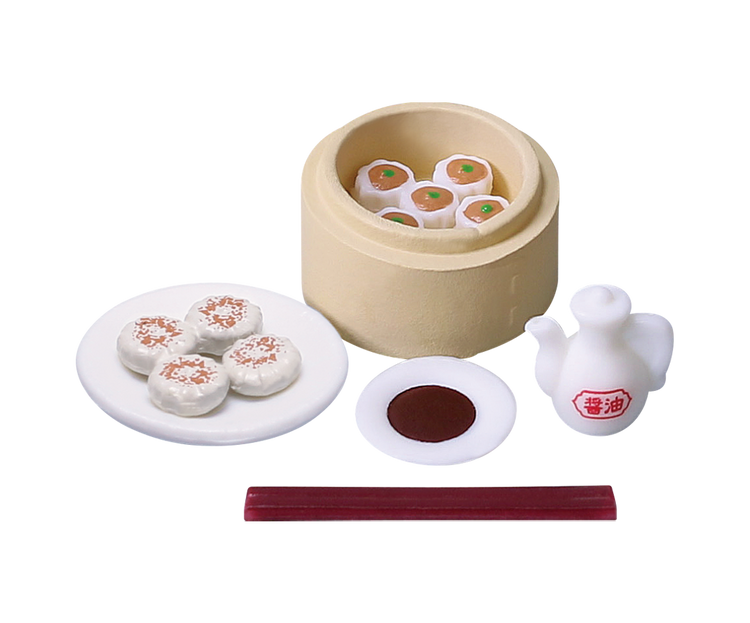 Tiny dim sum Gacha Series features a miniature dim-sum set with siu-mai, bao, soy sauce, and chopsticks, embodying Strangecat Toys' playful, collectible aesthetic.