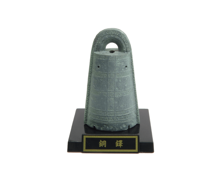 Small-scale replica of a Yayoi period dōtaku bell on stand, part of the Haniwa and bronzeware Gacha Series from Strangecat Toys.