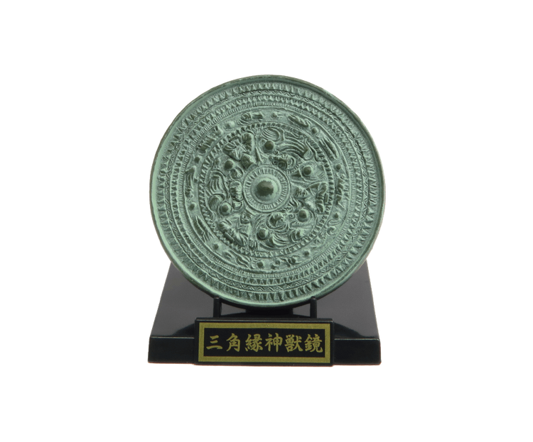 Cast-bronze Han-era divine beast mirror with triangular rim, featuring stylized animal and geometric patterns, part of the Haniwa and clay figurines + earthenware and bronzeware Gacha Series.