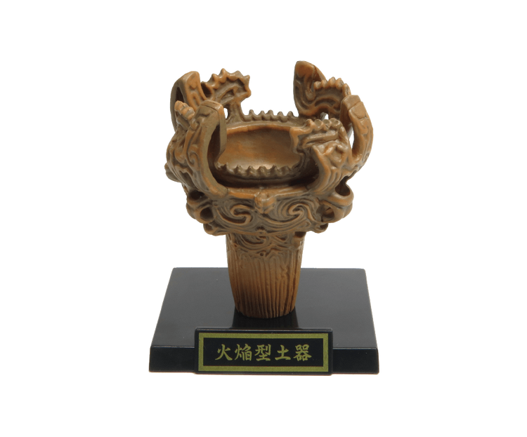 Small-scale replica of Jōmon flame-style pottery from the Haniwa and clay figurines + earthenware and bronzeware Gacha Series, on a black base with Japanese plaque.