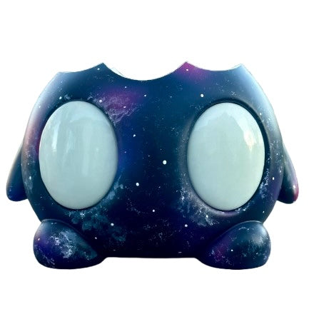 Bite Me - Nebula BIG Bites by Trash Panda, a mixed media art toy featuring a white oval object with expressive white eyes, resembling a planet.