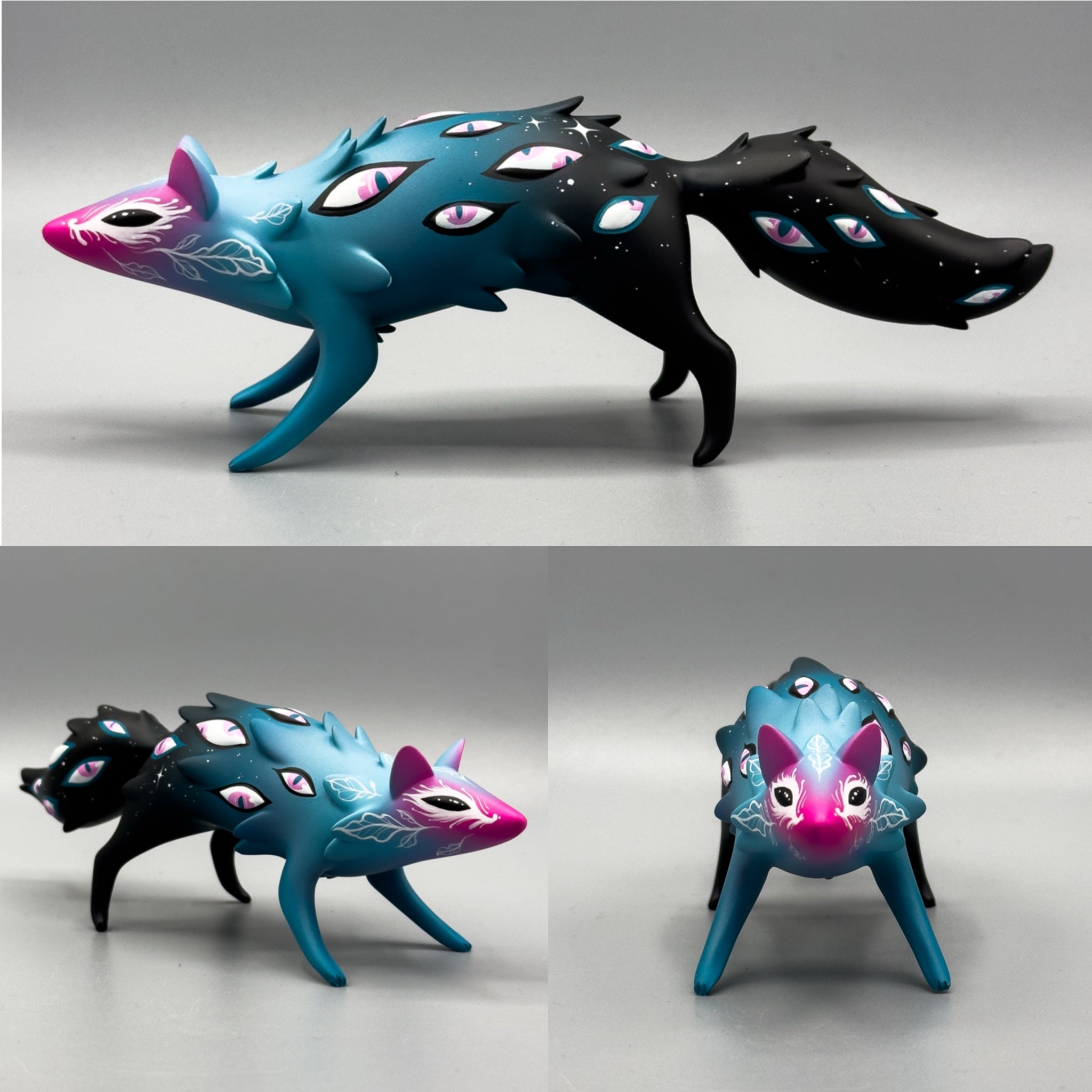 Stylized fox sculpture, ORACLE Group Show - Cosmyrr, with gradient colors, eye motifs, and delicate vine details, crafted by Tomodachi Island x Faunwood.