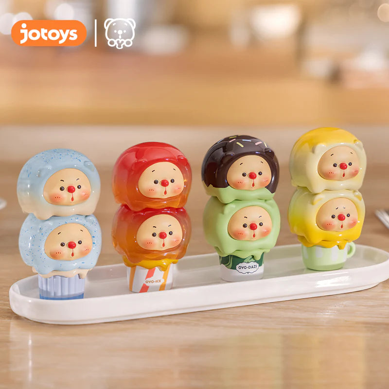 OYO Ice Cream Jenga Blind Box Series featuring assorted toy figurines on a tray, highlighting collectible designs from a blind box collection.