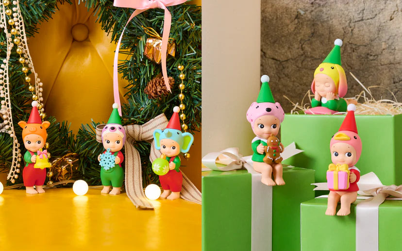 Santa's Little Helper Series features elf-like figurines in animal hoods, holding Christmas objects, set against wreaths and green gift boxes.