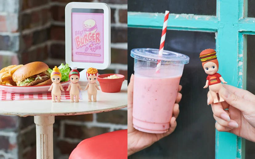 Sonny Angel - Snack Series figures amid burger, fries, milkshake scene; novelty mini-dolls wear condiment-themed hats, blending fast-food charm with collectible whimsy.