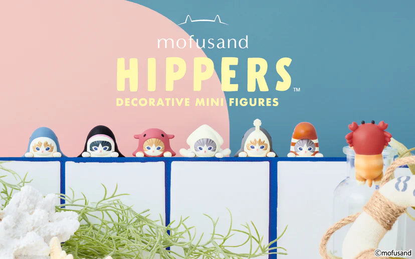 Mofusand HIPPERS figurines, featuring cat characters dressed as sea creatures, displayed on a shelf, ideal for decorating tech devices or frames.