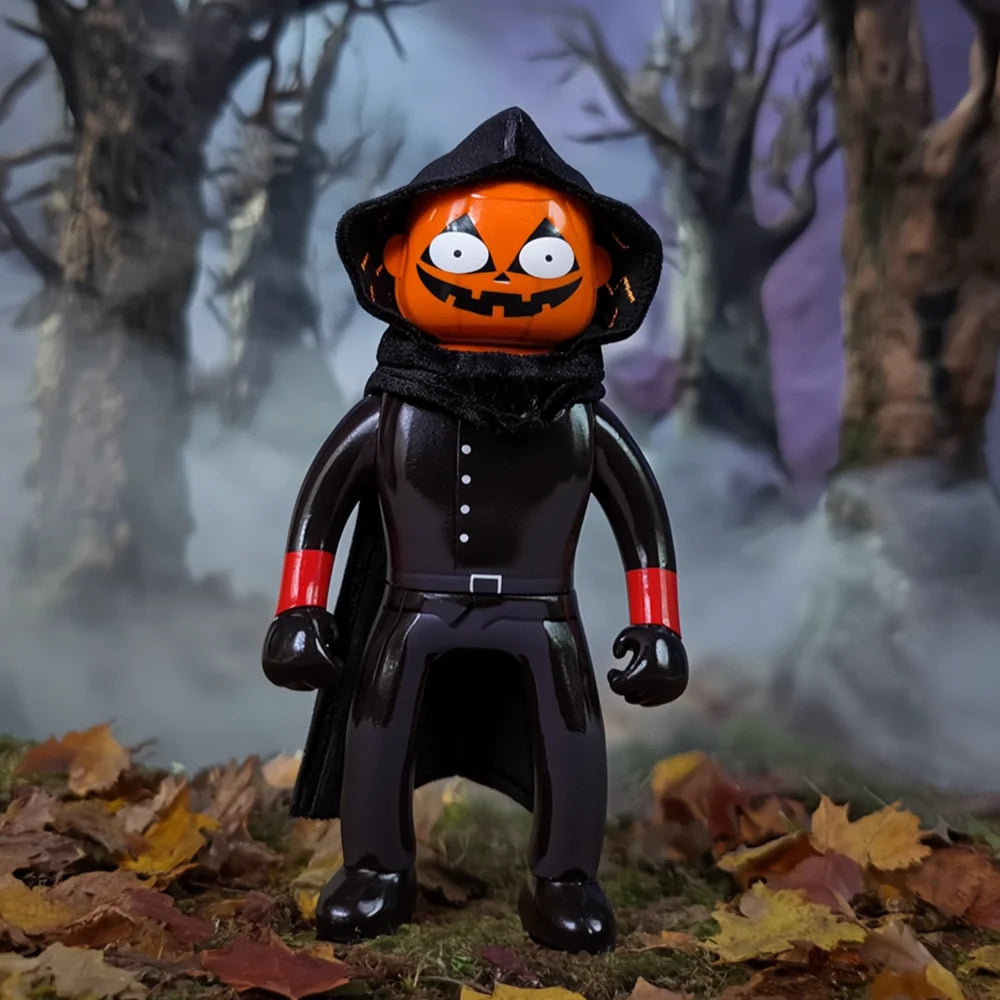 MR NOBODIES (HEADLESS HORSEMAN) toy figure with pumpkin head, black outfit, posed in spooky forest diorama. Preorder available from Strangecat Toys.