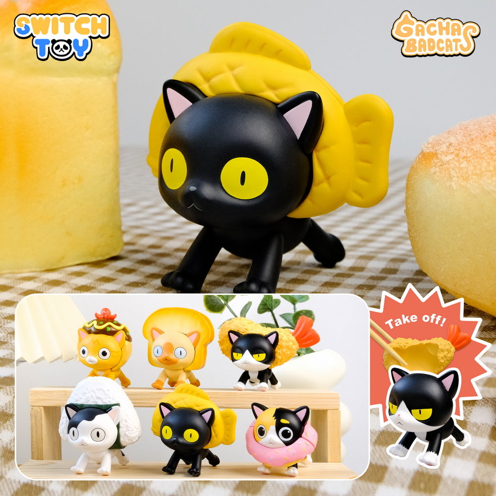 Gacha Bad Cats Blindbox figurine on gingham cloth, features black cat in yellow taiyaki hat, with lineup of five other cat variants below.