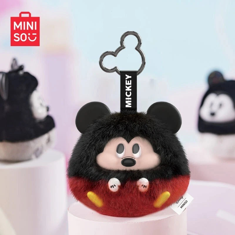 Disney Mickey Joyful Collision Series plush bag charm, featuring Mickey's face, ears, and mittened hands, with a Mickey-shaped clip for attachment. Available for preorder.