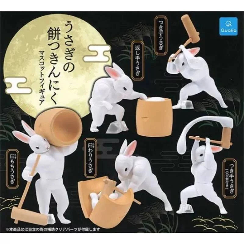 Rabbit Mochi-Pounding Mascot Figures by Qualia show five rabbits performing mochitsuki tasks. Blind-box Gacha series offers random figures, capturing traditional Japanese ritual charm.
