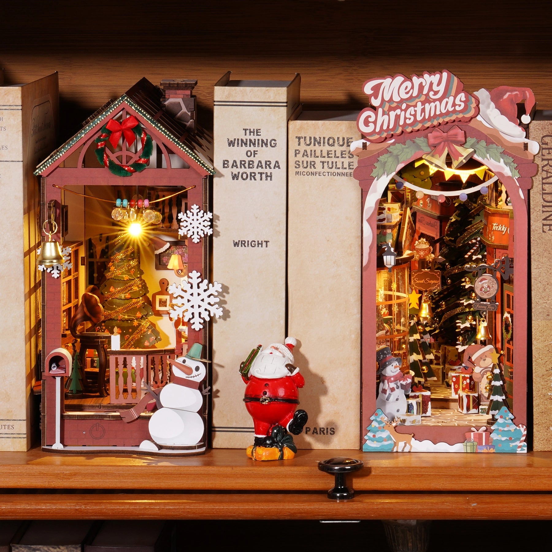 Rolife DIY Book Nook Insert - Christmas Street TGC06 features illuminated dioramas with festive scenes, complemented by a ceramic Santa, perfect for holiday-themed displays.