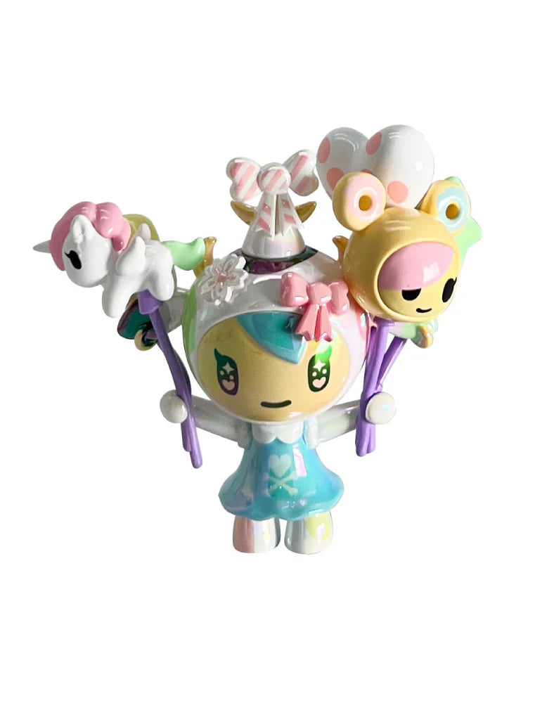 tokidoki 20th Anniversary Blind Box figure: a pastel vinyl art-toy of a girl in an animal-ear hood, holding balloon creatures, celebrating iconic characters.