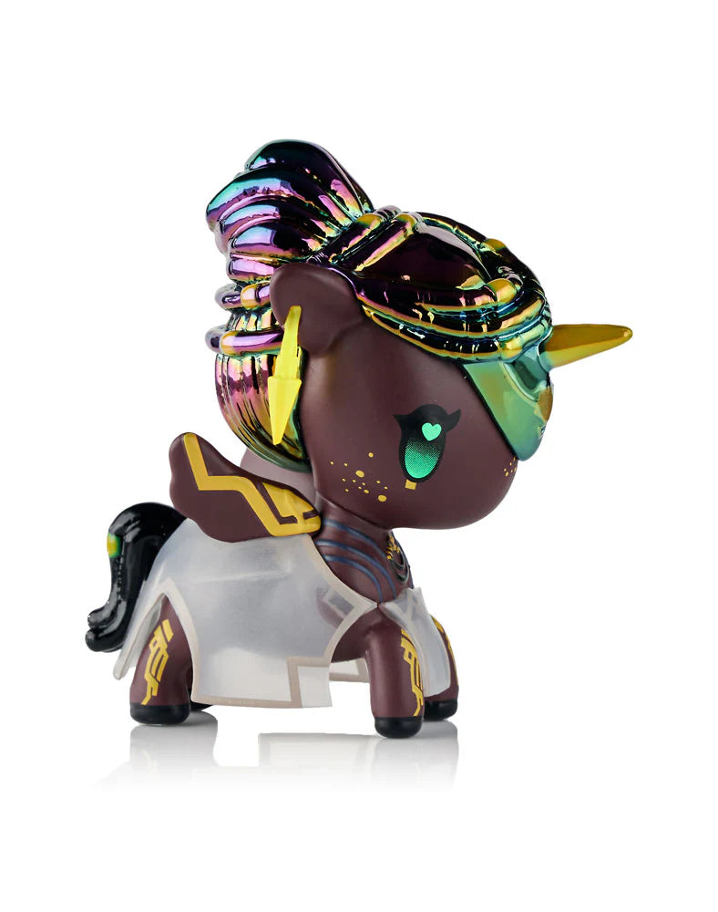 tokidoki x ARCANE Unicorno Black Light Chrome Blind Box figurine with dark brown body, metallic rainbow mane, golden horn, and translucent cape, collectible art toy.