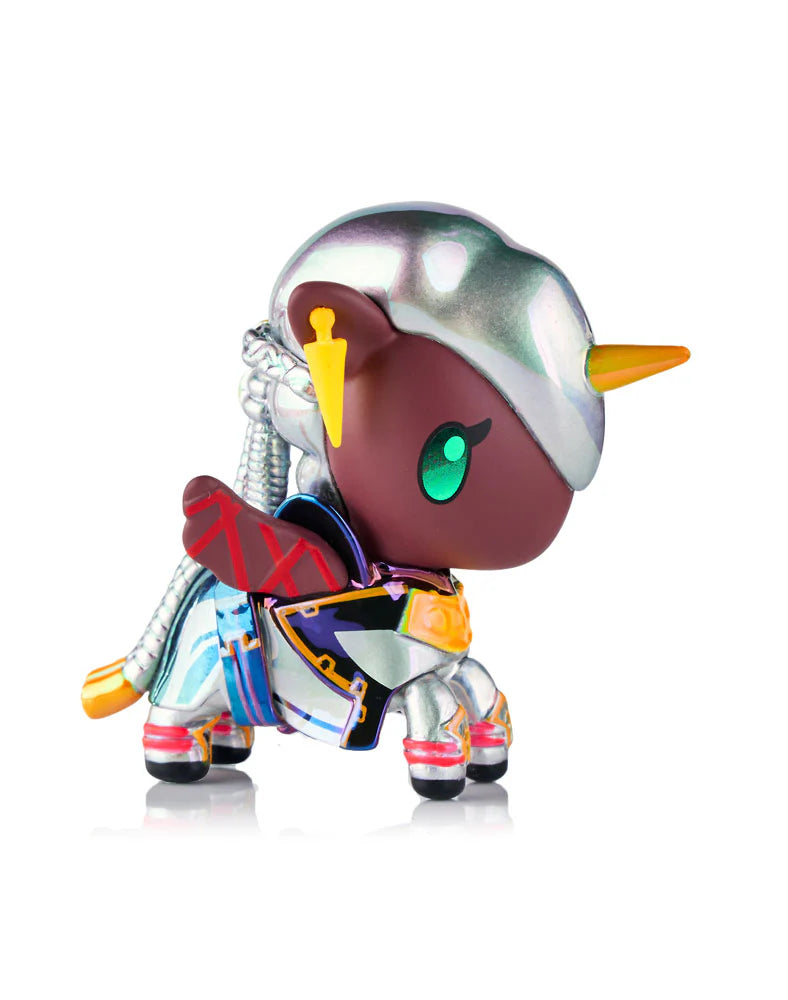 tokidoki x ARCANE Unicorno Black Light Chrome Blind Box: A 2.75-inch collectible unicorn with metallic-silver mane, futuristic armor, and golden horn. Glows under black light.