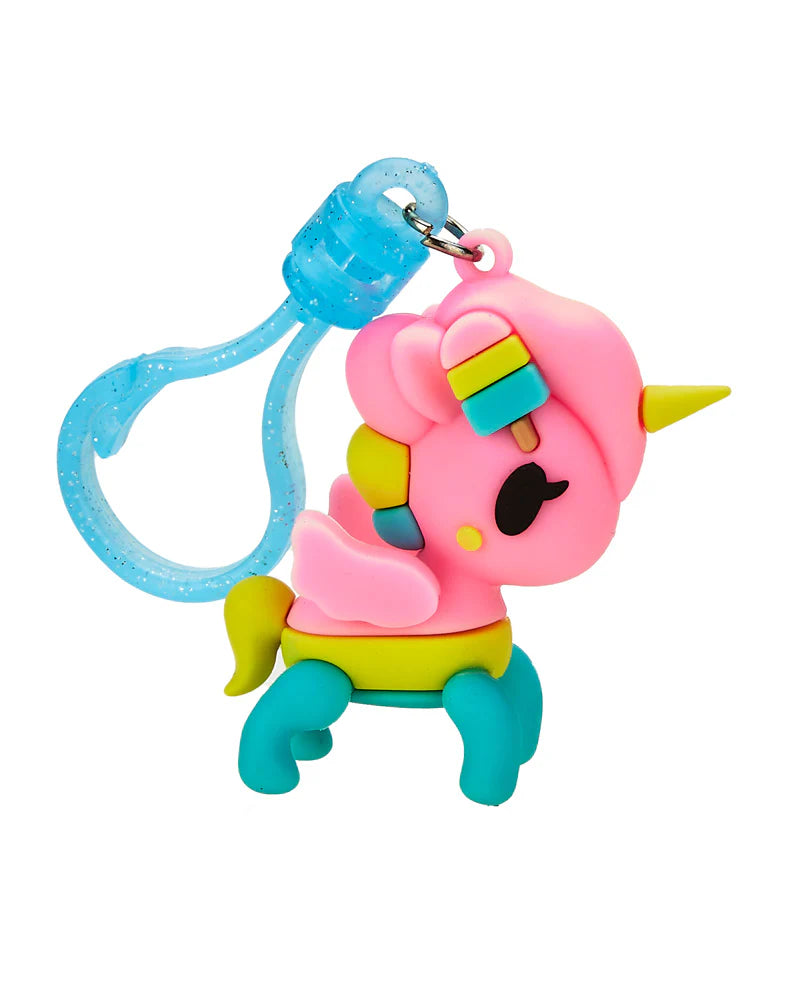 tokidoki Characters Series 2 Blind Bag Figural Bag Clip featuring a pink unicorn keychain with a blue handle, ideal as a collectible and accessory.