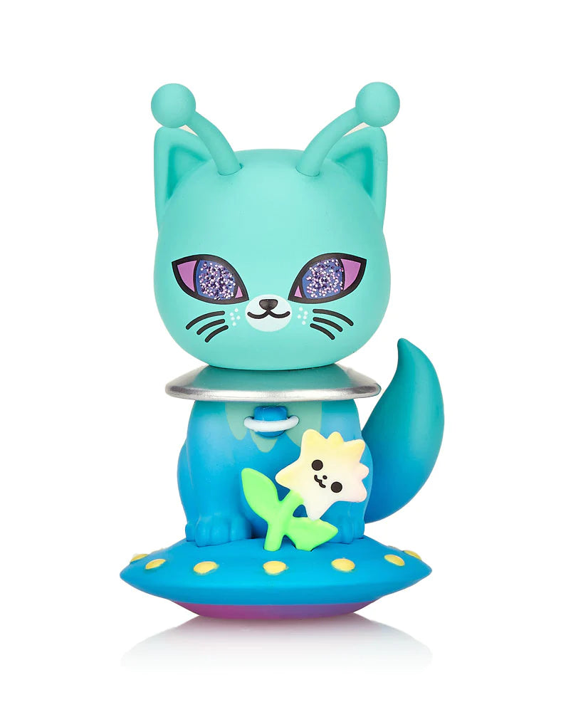 A toy cat figure with a unique face and accessories from the Galactic Cats Blind Box series by Strangecat Toys.