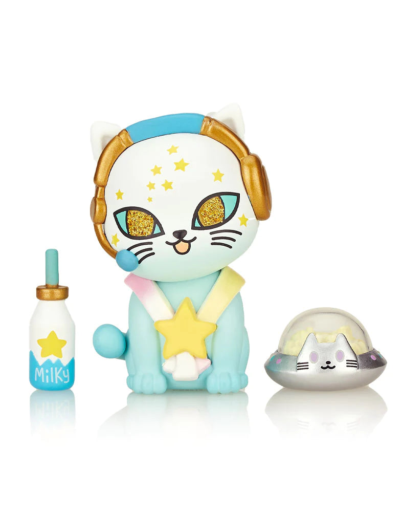 A toy animal with a star, gold headphones, and a bottle, part of the Galactic Cats Blind Box series.