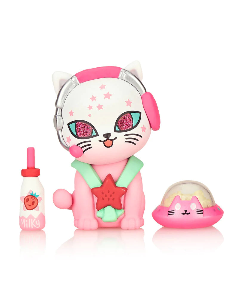 A toy animal with headphones, a bottle, and a pink cat figurine in the Galactic Cats Blind Box series.
