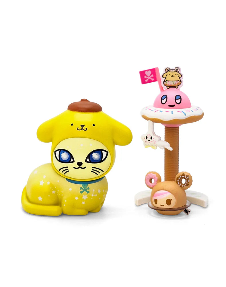 tokidoki Galactic Cats x Hello Kitty & Friends Blind Box featuring a starry-eyed cat in Pompompurin hat and a donut-themed carousel with mini pastry-animal characters.